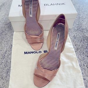 Gorgeous Manolo Blahnik heels that are a pretty shade of nude/pink.